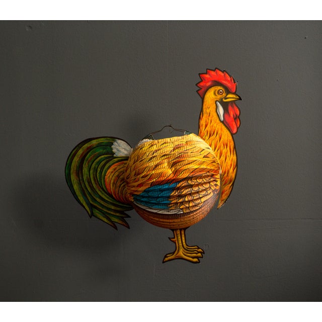 Paper lantern as a rooster, made in West Germany from the 60s. Rare lantern as a rooster figure, in the middle below, with...