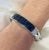 Invisible Set 19 Carat Square Blue Sapphire & Diamond Bangle in 14k White Gold For Sale - Image 9 of 11