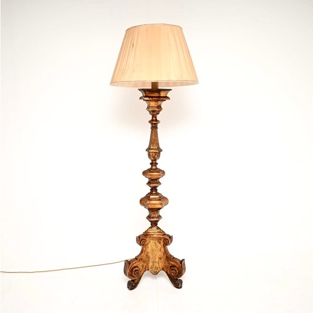 A wonderful antique Italian Renaissance style gilt wood floor lamp. This was made in Italy, likely Florence, it dates from...