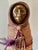 A compelling mixed media figurative sculpture by American artist Naida Seibel, signed at the base and created as part of a...
