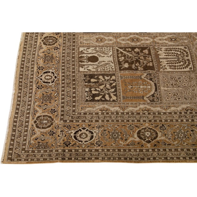 Beautiful antique Tabriz hand-knotted wool rug with a brown color field. This Persian rug has beige and tan accents in a...