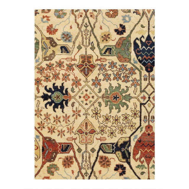 Heriz rug features a stunning design, with bold geometric patterns and rich, vibrant colors that are characteristic of the...