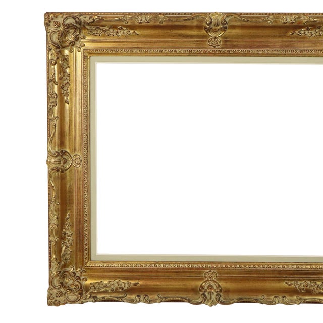 Beautiful and impressive gold frame, entirely in classic Baroque style, elaborately decorated with acanthus leaves,...
