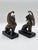This rare pair of antique late 19th-century heavy bronze Griffin bookends/candleholders exudes a sense of history and...