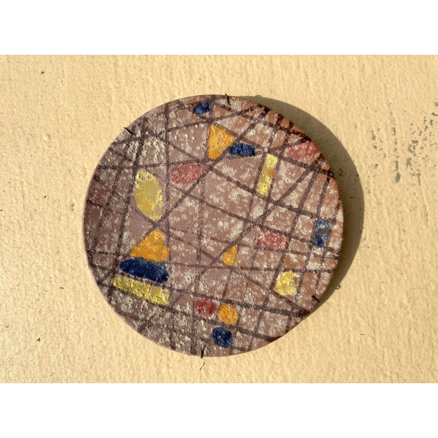 Midcentury plate, signed Italy. Looks very similar to Bitossi and done in the Mondrian style. Ceramic.