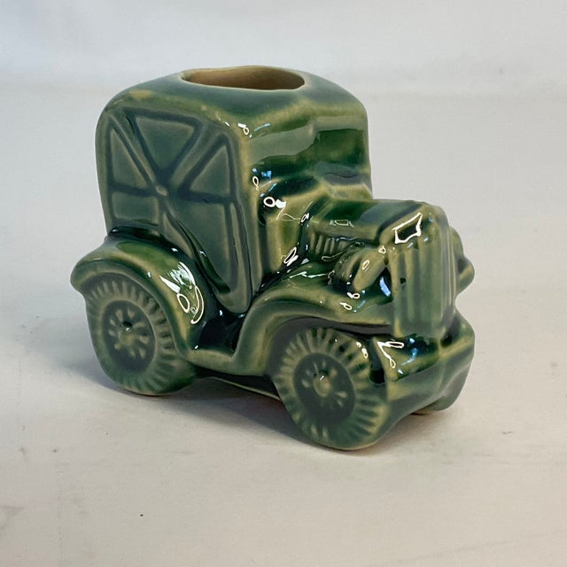 Whimsical Mid-Century Ceramic Toothpick Holder in the shape of a car. Fun little piece to charm your guests. From the...