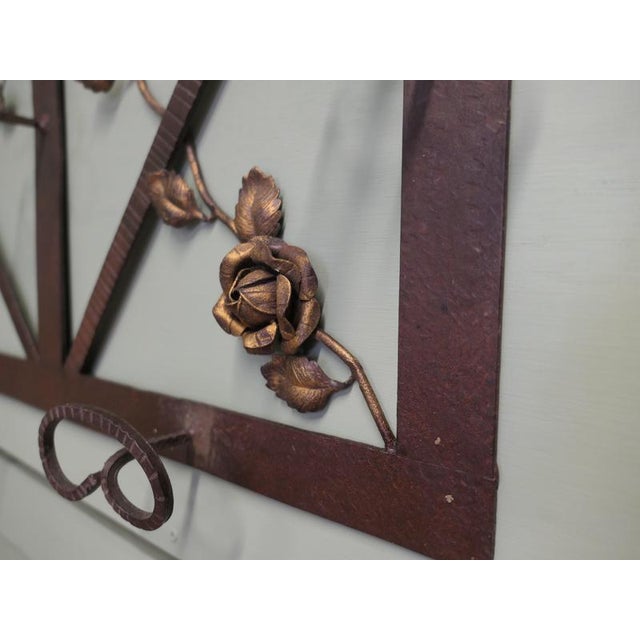 French Art Deco Iron Hat and Coat Rack with Shelf Decorated with Roses This Art Deco period piece coat rack includes a...