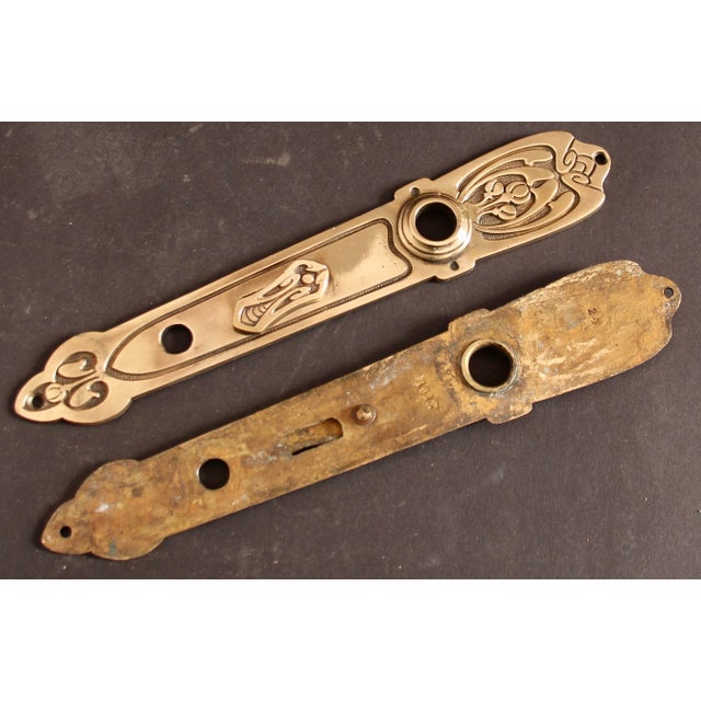 Immerse yourself in the world of historical design with our exquisite set of eight antique door fittings in the Berlin Art...