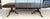 This Drexel Heritage dining table features a rich mahogany finish with contrasting banded inlay that highlights its...