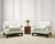 An exceptional pair of "No. 619" mint white upholstered Ming style lounge chairs made by A. Rudin, Los Angeles, CA. The...