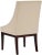 The simpli of lines and gently sloping arms of the cream-colored leather upholstered Sloping chair, with legs in cherry...