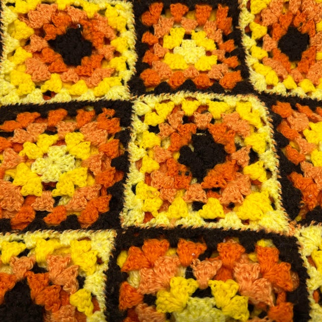 Vintage hand crocheted traditional granny square afghan (as seen on Roseanne) measuring approximately 48" X 68". The...