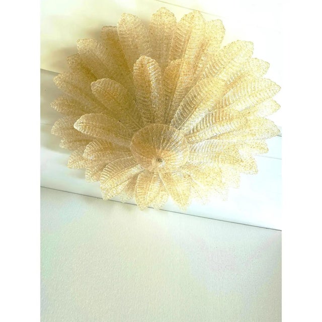 All leaves are made in a traditional slab Murano glass working with amber "graniglia" fruit of hight italian craftmanship....