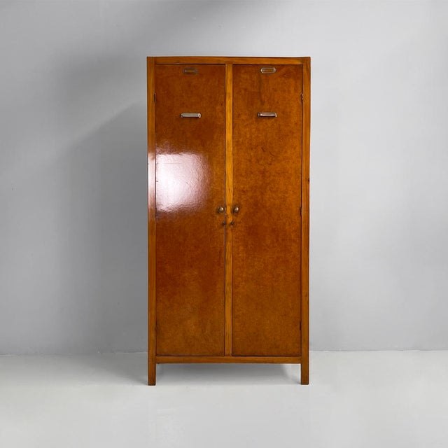 Italian Art Deco wooden wardrobe with hinged doors, 1930s Wardrobe made entirely of wood. The structure, made of boxwood,...
