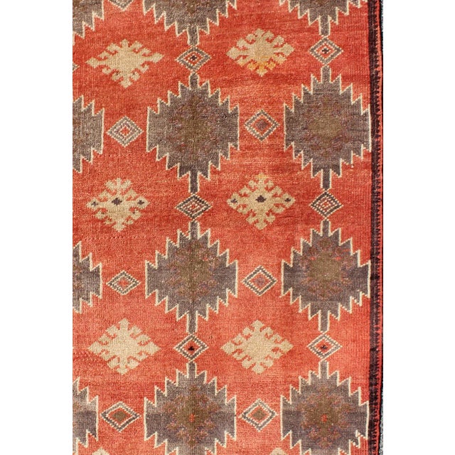 Turkish Oushak Tulu Rug with Geometric Medallions in Orange, Ivory, Gray and Brown Measures: 3'2 x 5'6 Vintage Tulu Rug...