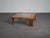 A distinctive modernist coffee table from the netherlands, dating from the 1970s. The substantial wenge frame is...