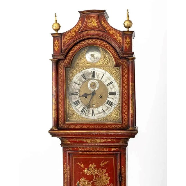 George II Red Japanned and Gilt Longcase Clock, circa 1760, the brass and silver-tone metal clock face marked "James...