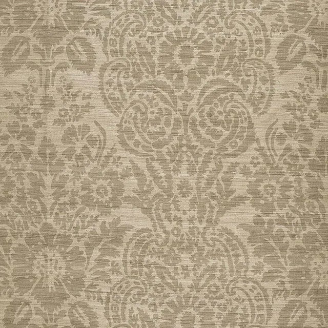 This soft damask design is screen printed by hand on a natural tussah silk ground. The use of raw silk yarns gives the...
