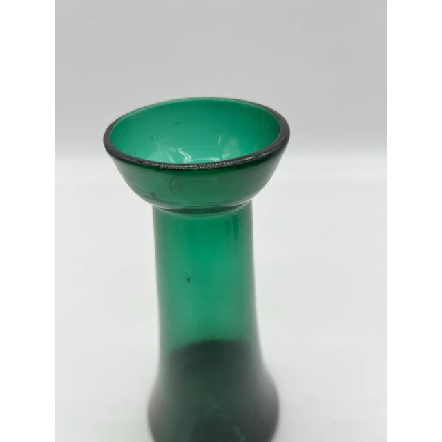 A Antique Blown Dark Green Glass Hyacinth Vase, Bristol, England, Circa 1840's Most likely made in Bristol, England. Circa...