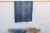 A masterwork of Malian textile heritage featuring deep indigo saturation and symbolic geometric motifs. Originating from...
