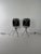 Striking pair of designer floor lamps with a modern, minimalist form. The shades are made of smoked glass with a mirrored...