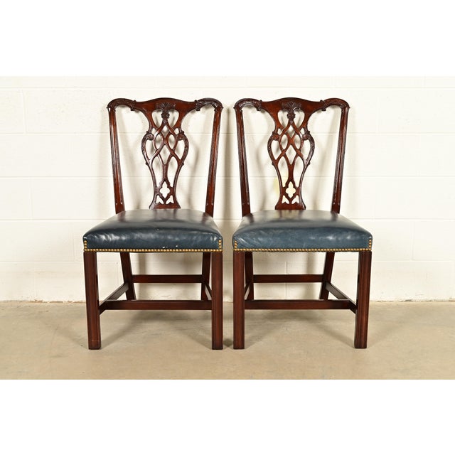 A gorgeous pair of Georgian or Chippendale style side chairs or dining chairs By Councill Craftsmen USA, Circa 1980s...
