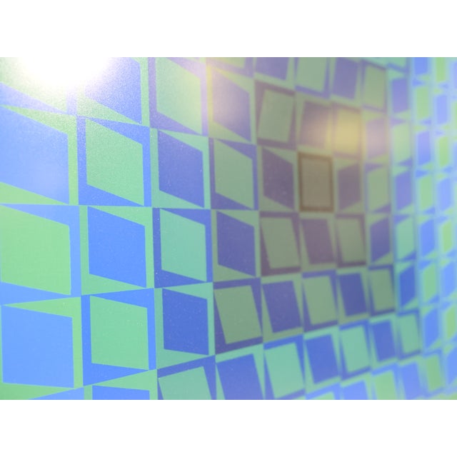 Signed color screenprint "Permutations" by Victor Vasarely, 1960. Original color screenprint on heavy card stock with a...