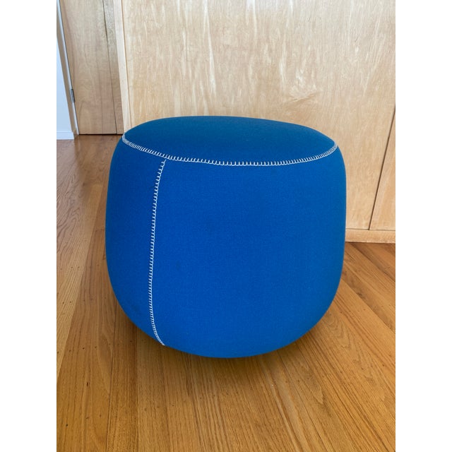 Bernhardt Designs pouf round ottoman from the Apel series in blue fabric. Distinctive Bernhardt stitching and subtle...