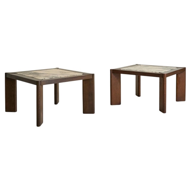 A Belgian side table from 1976, where material contrast and proportion define the design. Low and grounded, the form is...