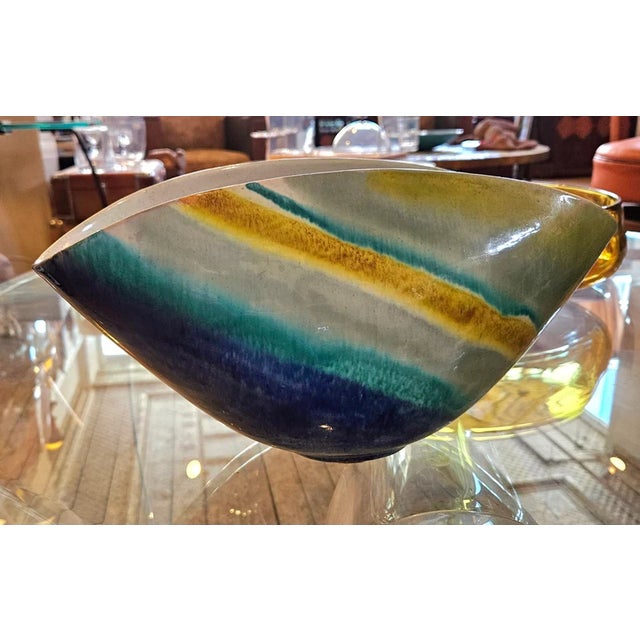 This is an Italian Mid Century glazed pottery bowl by Alvino Bagni for Raymor. The colors are rich and include cobalt...