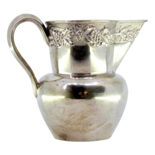 Silver Wine Jug with Reliefs and Applications of Leaves and Grapes For Sale
