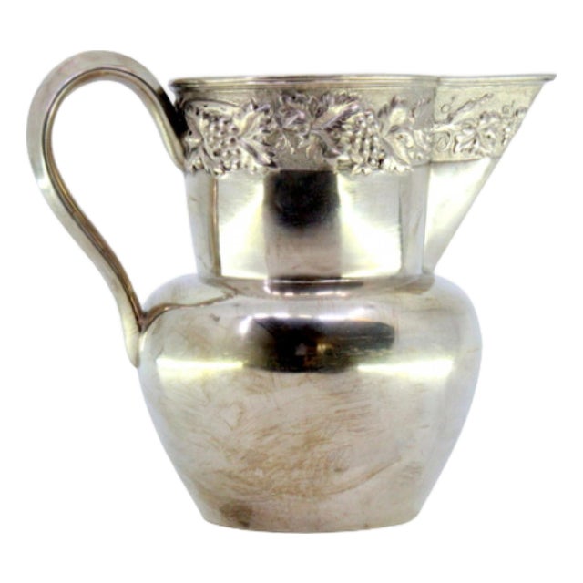 Silver Wine Jug with Reliefs and Applications of Leaves and Grapes For Sale