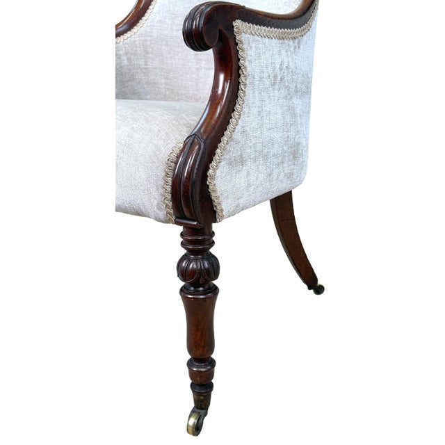 A Good Quality Late Regency Period Mahogany Tub Library Armchair, Having Swept Upholstered Back with Attractive Scrolling...