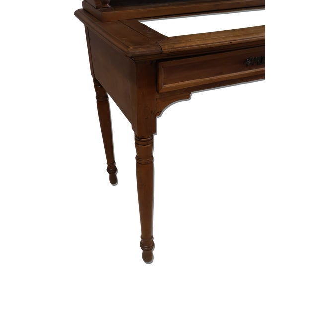 A charming late 19th-century French walnut Bonheur du Jour writing desk, dating to the 1880s. This elegant ladies' desk...