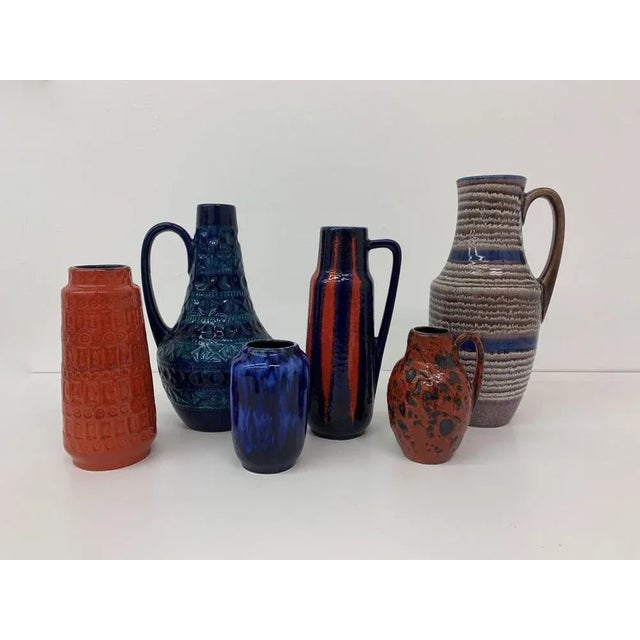 Dimensions: left to right: 23cmh, 11cm diameter 31cm h, 17cm diameter 14cm h, 10cm diameter 28cm h, 12cm diameter 15,5cmh,...