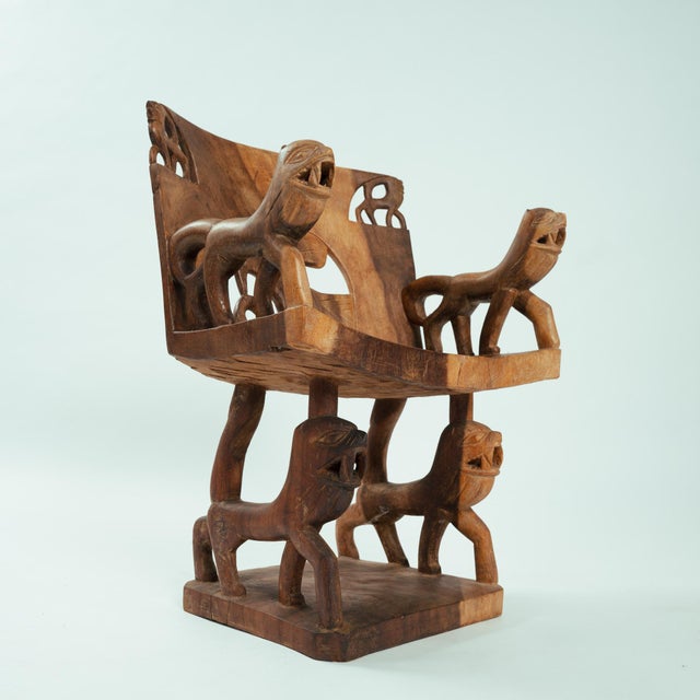 Mid-20th Century Fon Dignitary Monoxyl Carved Wood Armchairs & Table Set, Kingdom of Dahomey (Benin) An extraordinary and...