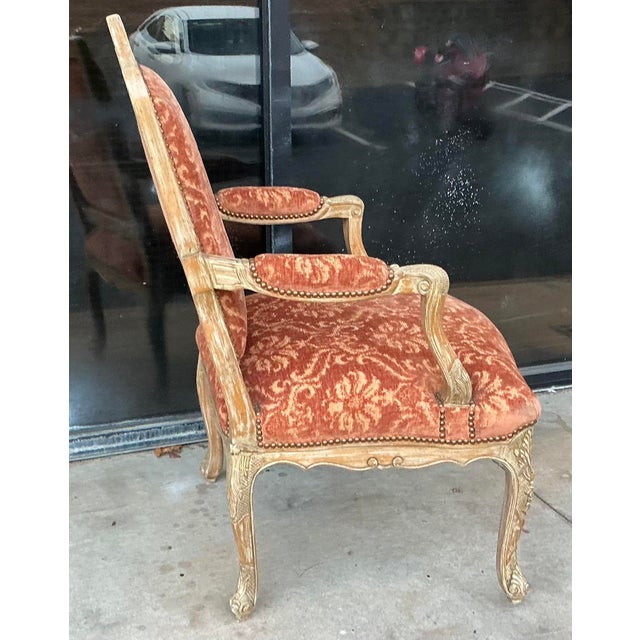 This is a cerused and carved French Louis XV style bergere chair by Canadian manufacturer William Switzer. The fabric is...