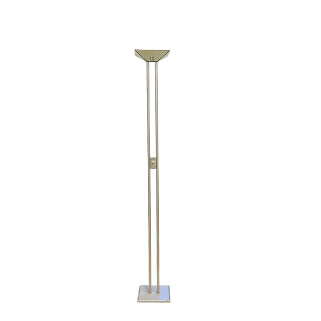 Elegant mid-century floor lamp by Fratelli Martini, Italy, 1970s. Striking minimalist floor lamp featuring a slender...