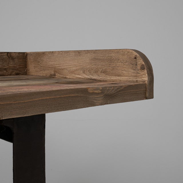 This 20th Century French industrial work table is a striking piece that blends utility with strong architectural presence....