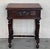 20th century pair of solid carved oak French nightstands with turned columns and stretcher. It has one carved drawer with...