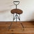 A really unusual Danish modern plant stand or side table with a sculptural black metal frame and teak top. While it works...