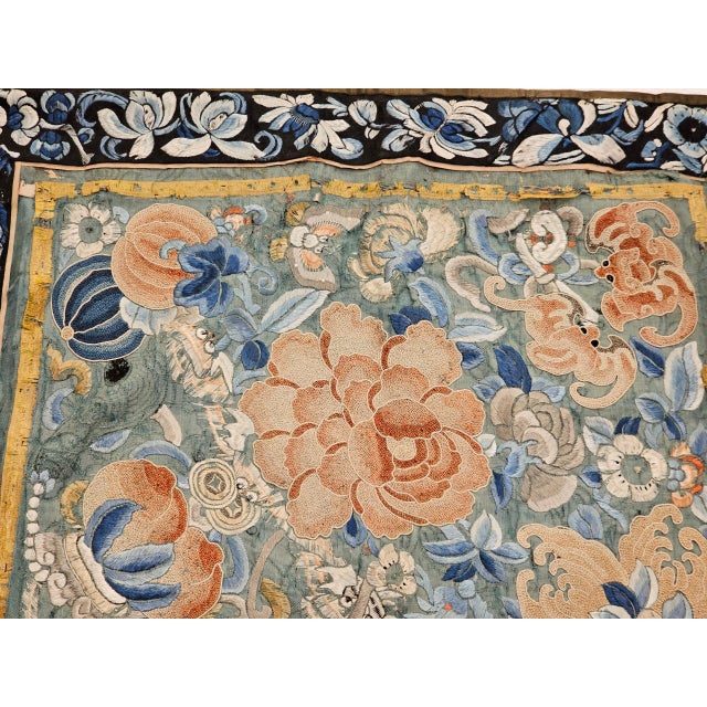 A rare and exquisite pair of 19th century Chinese hand-embroidered silk panels, showcasing masterful craftsmanship and...