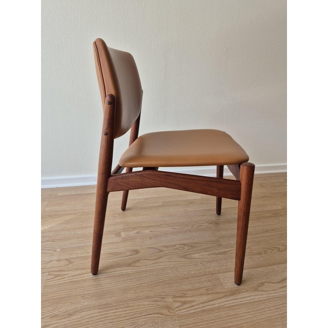 Exceptional original Erik Buch “Captain” dining chairs crafted in solid teak in Denmark during the 1960s. A true...