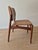 Exceptional original Erik Buch “Captain” dining chairs crafted in solid teak in Denmark during the 1960s. A true...