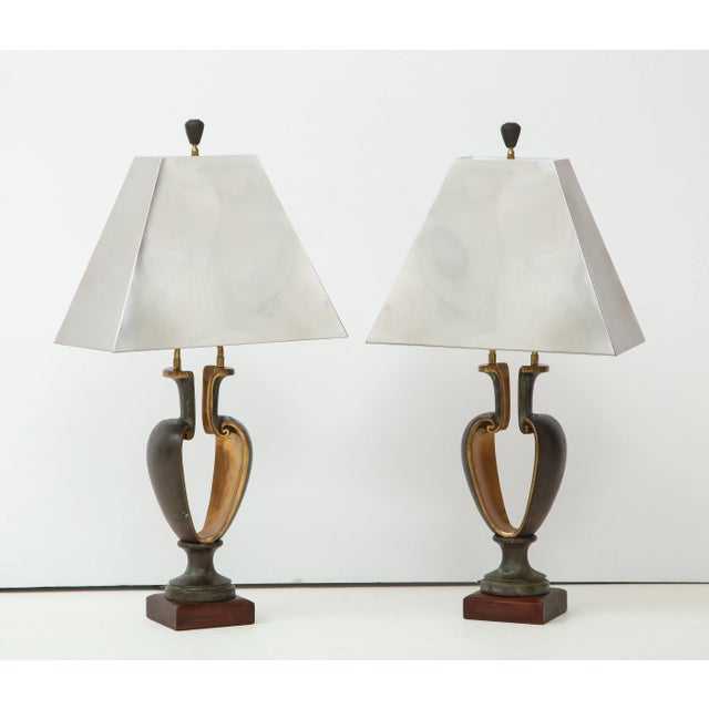 Stunning pair of 1980s solid bronze Brutalist style table lamps with chrome shades. The lamps are well made and very heavy...