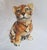 Hand-painted ceramic animal sculpture of a tiger cub with innocent eyes. Made in Italy in the 1970s.
