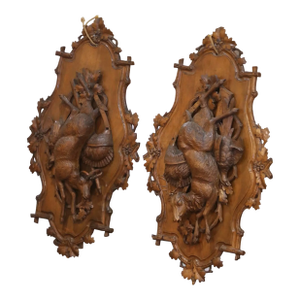 Pair of 19th Century Swiss Black Forest Carved Walnut Hunt Trophy Sculptures
