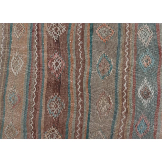 Textile Mid 20th Century Mid 20th Century Vintage Turkish Gallery Kilim With Stripes and Tribal Motifs in Muted Tones For Sale - Image 7 of 13