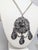 1972-1974 Brutalist silvertone round openwork with bumps center pendant with three tear drop shaped pendants of the same...