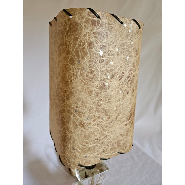 A Pair of MCM Fiberglass and Glass Side table lamps. Featuring decorative thick clear glass base with clip on fiberglass...